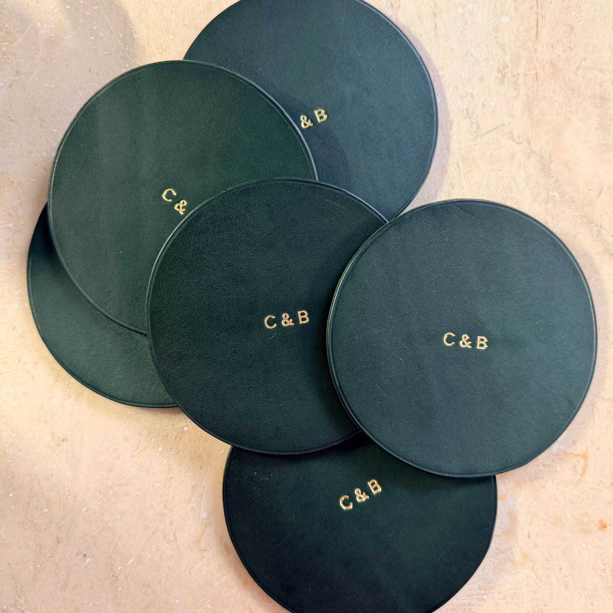 Dessous de verre en cuir personnalisables