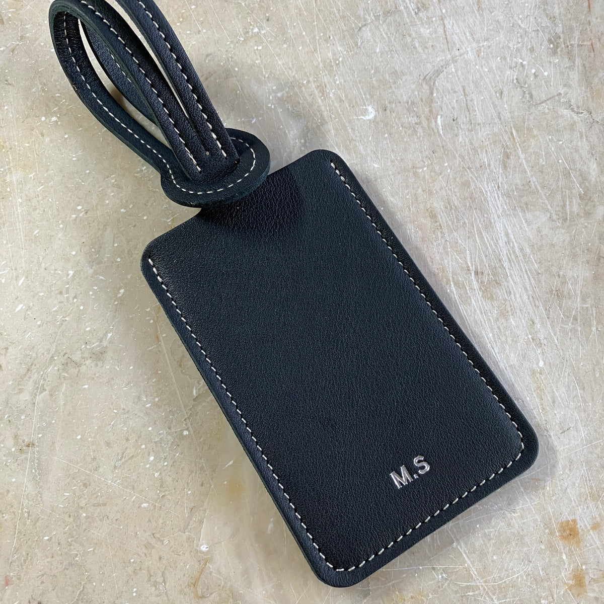Étiquette à bagage en cuir personnalisable